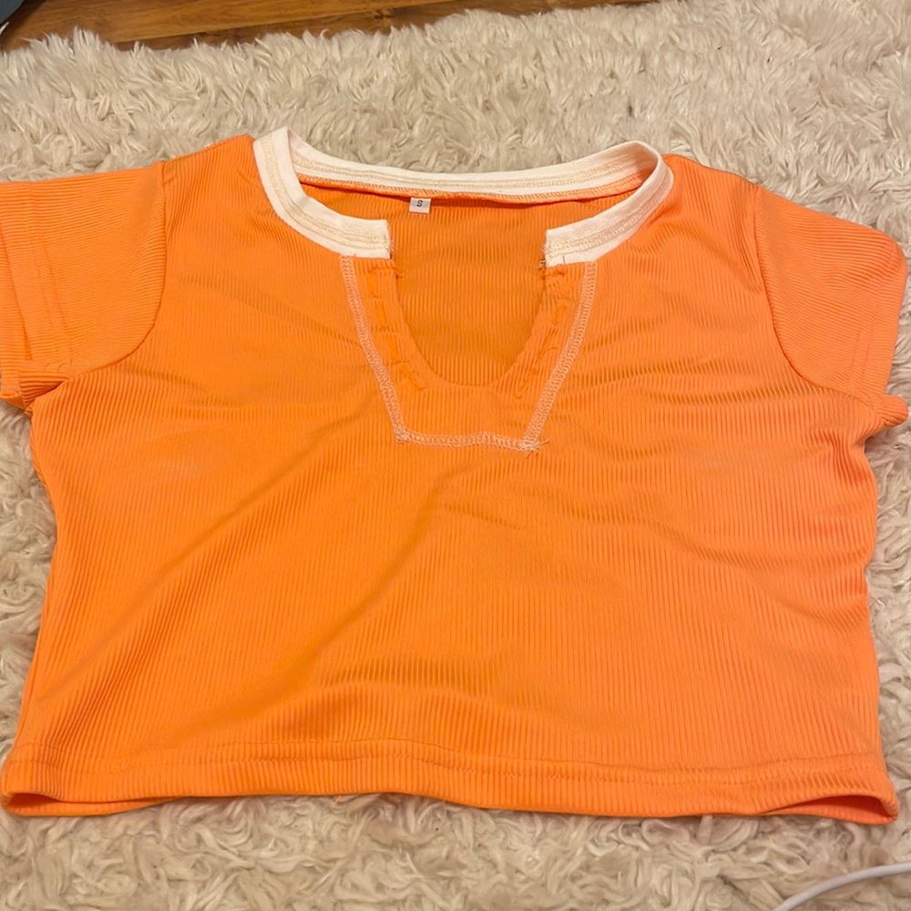 Orange faux button crop top